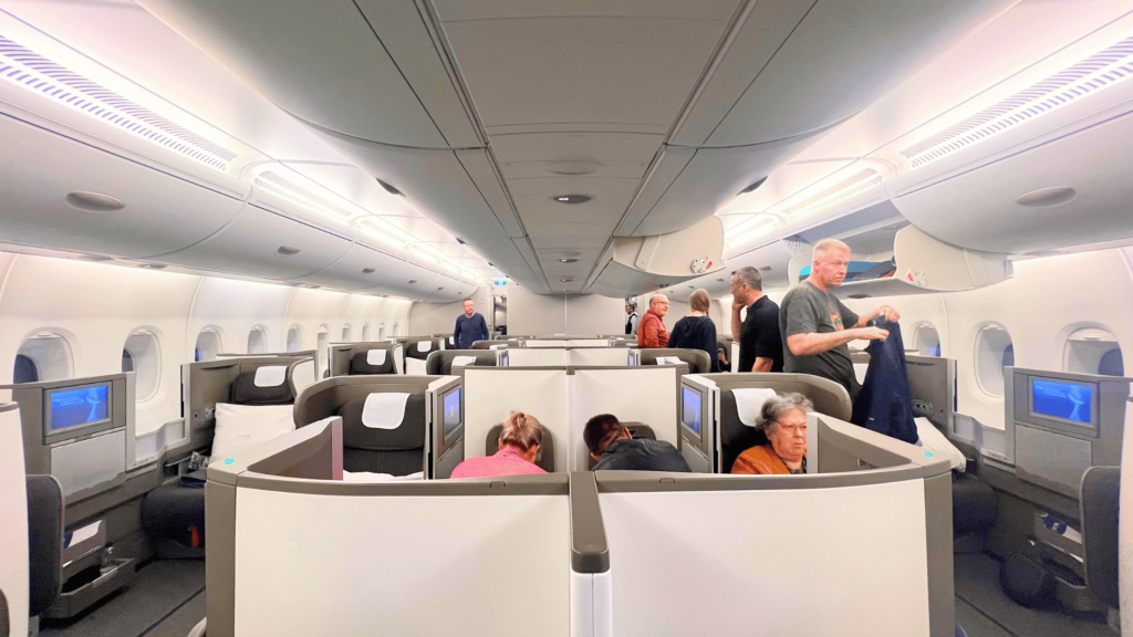 British Airways A380 Business Class Cabin | Journey Beyond 40 the luxurious business class cabin on a british airways a380, showcasing spacious seats and a modern, stylish interior.